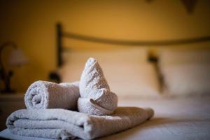 Postel nebo postele na pokoji v ubytování B&B L'Albero Dei Limoni