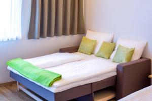 Postel nebo postele na pokoji v ubytování Hotel-Restaurant Lampenhäusl