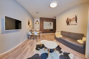 Sjónvarps- og/eða afþreyingartæki á Aparthotel Svatý Vavřinec