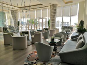 Posezení v ubytování Royal M Hotel Abu Dhabi by Gewan
