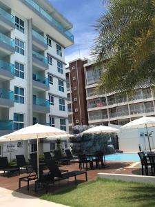 Swimmingpoolen hos eller tæt på Grandblue condominium Room401 LeamMae phim Beach