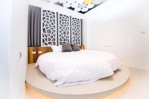 Postel nebo postele na pokoji v ubytování Zih Yue Tong Homestay II