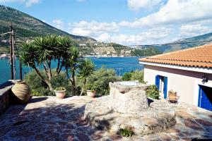 a house with a view of the water at Villa Marika in Vathi, Ithaka