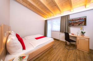 Postel nebo postele na pokoji v ubytování Hotel-Restaurant Lampenhäusl