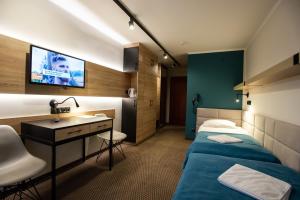 TV a/nebo společenská místnost v ubytování Hotel Halo Szczyrk