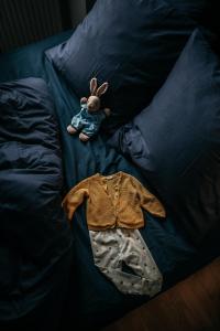 Postel nebo postele na pokoji v ubytování Urbn Dreams III