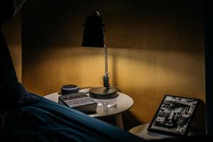 Postel nebo postele na pokoji v ubytování Urbn Dreams III