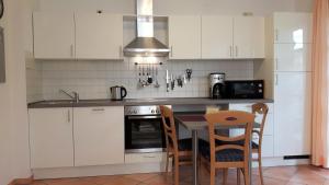Dapur atau dapur kecil di Ferienhaus Südstrand