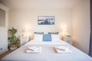 Cama ou camas em um quarto em Villa Lena