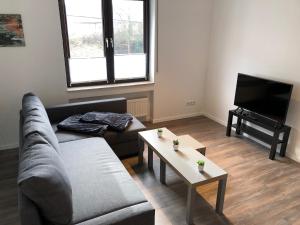 Posezení v ubytování Ferienwohnung "An der Stadtmauer"