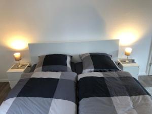 Postel nebo postele na pokoji v ubytování Ferienwohnung "An der Stadtmauer"