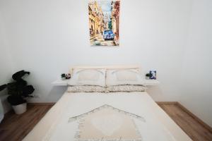 Posteľ alebo postele v izbe v ubytovaní La Boutique del Vento - Esclusivo in pieno centro