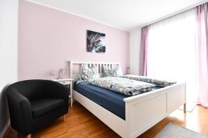 Letto o letti in una camera di Haus Vollmeier
