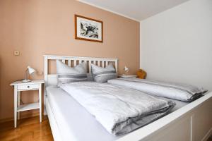 Letto o letti in una camera di Haus Vollmeier