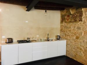 Cuina o zona de cuina de Olivia Suite Charme&Relax