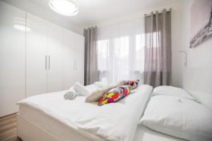 Postel nebo postele na pokoji v ubytování Friday Apartments