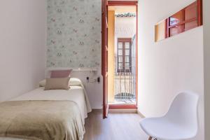 Łóżko lub łóżka w pokoju w obiekcie Centro, 3BD y 2BA, 1min Catedral, duplex de lujo