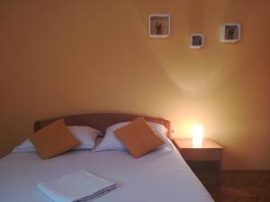 Postel nebo postele na pokoji v ubytování Apartments 2D