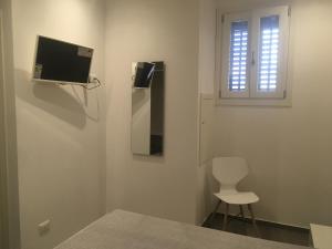 TV a/nebo společenská místnost v ubytování B&B Marconi + 22 fotografií