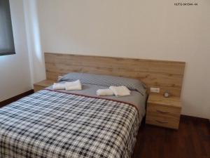 Llit o llits en una habitació de Habitatge Turístic Cal Ferrer