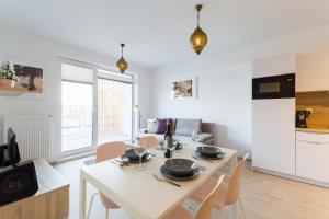 Kuchyň nebo kuchyňský kout v ubytování Apartament Rose