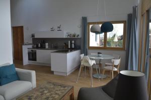 Η κουζίνα ή μικρή κουζίνα στο Ferienwohnung Loisachweg