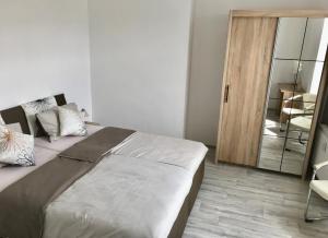 Voodi või voodid majutusasutuse Apartmány Dagmar toas