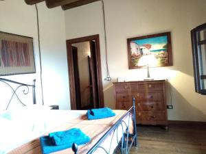 Postel nebo postele na pokoji v ubytování Villa Siciliana con piscina e vista panoramica sul mare