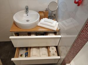 A bathroom at Belvárosi Apartmanszálló - Kiskunfélegyháza