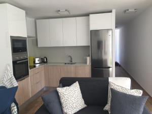 Kuchyňa alebo kuchynka v ubytovaní Esmeralda Apartment