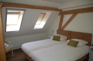 Postel nebo postele na pokoji v ubytování Bed & Breakfast Appeltern