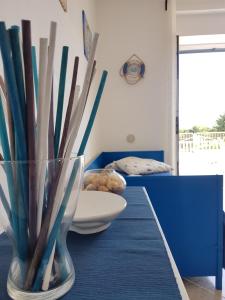 Postel nebo postele na pokoji v ubytování Punta Grande - Scala dei Turchi