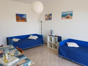 Postel nebo postele na pokoji v ubytování Punta Grande - Scala dei Turchi