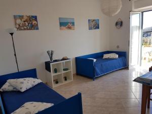 Postel nebo postele na pokoji v ubytování Punta Grande - Scala dei Turchi