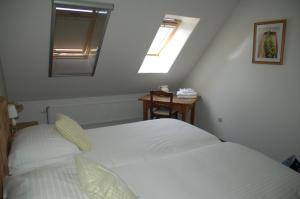 Postel nebo postele na pokoji v ubytování Bed & Breakfast Appeltern