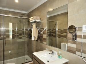 Koupelna v ubytování Hotel Rural Rocha da Gralheira