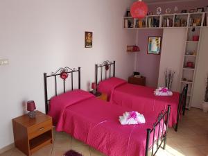 Posteľ alebo postele v izbe v ubytovaní La Casa del Sole