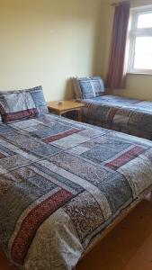 Postel nebo postele na pokoji v ubytování Tomedjocon