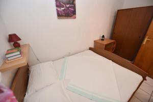 Postel nebo postele na pokoji v ubytování Apartment TinaTeo, Gajac + 37 fotografií