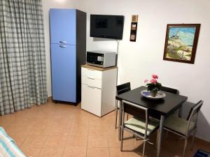 Kuchyň nebo kuchyňský kout v ubytování "casa le Palme"
