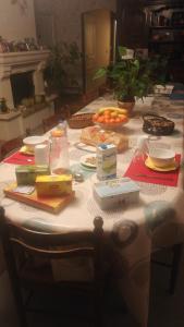 a table with food on top of it at maison la croix chambre chez l ' habitant in Marsac +5 photos