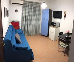 TV a/nebo společenská místnost v ubytování "casa le Palme"