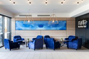 Posezení v ubytování Mantra MacArthur Hotel
