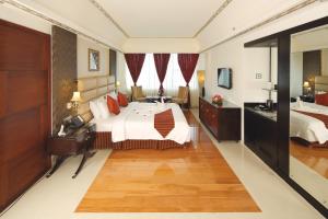 Katil atau katil-katil dalam bilik di Windsor Rajadhani Hotel