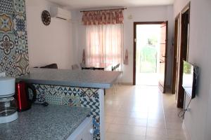 Kuchnia lub aneks kuchenny w obiekcie Geraneos Playa