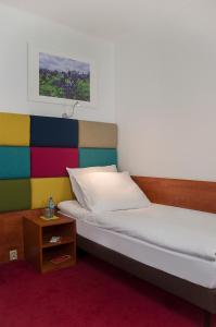 Posteľ alebo postele v izbe v ubytovaní euroHOTEL Sosnowiec Kazimierz
