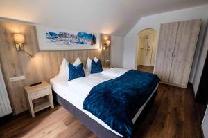 Posteľ alebo postele v izbe v ubytovaní Aktiv Hotel Karnia