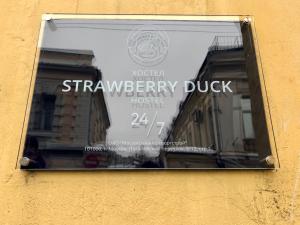 a window of a building with graffiti on it at Strawberry Duck Moscow in Moscow