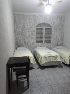 Lova arba lovos apgyvendinimo įstaigoje Araca Hotel