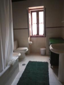 Ванная комната в Casa da Sicó